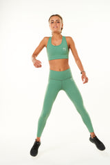 Model wearing Sagebrush 7/8 leggings with black singlet. Workout leggings for any activity.