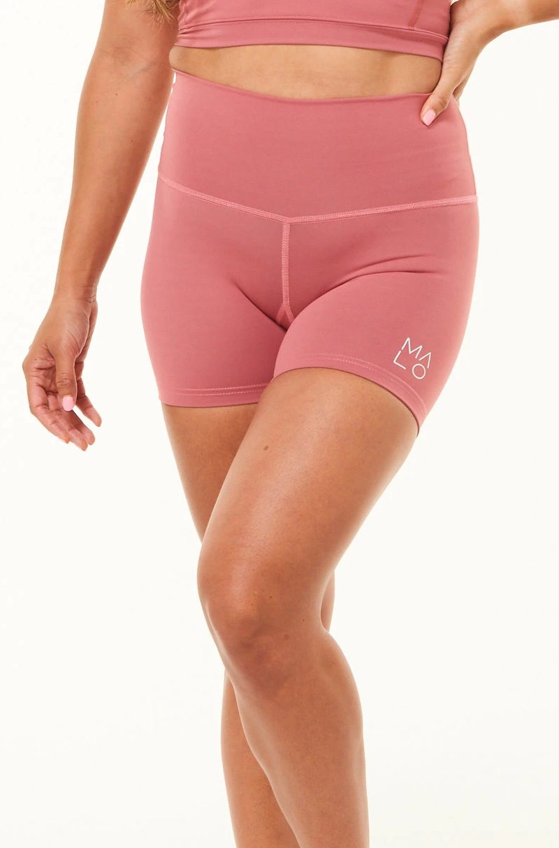 Nantucket Little Bit Longer Shorts. Women's high-waisted pink workout shorts. Pink athleisure shorts.