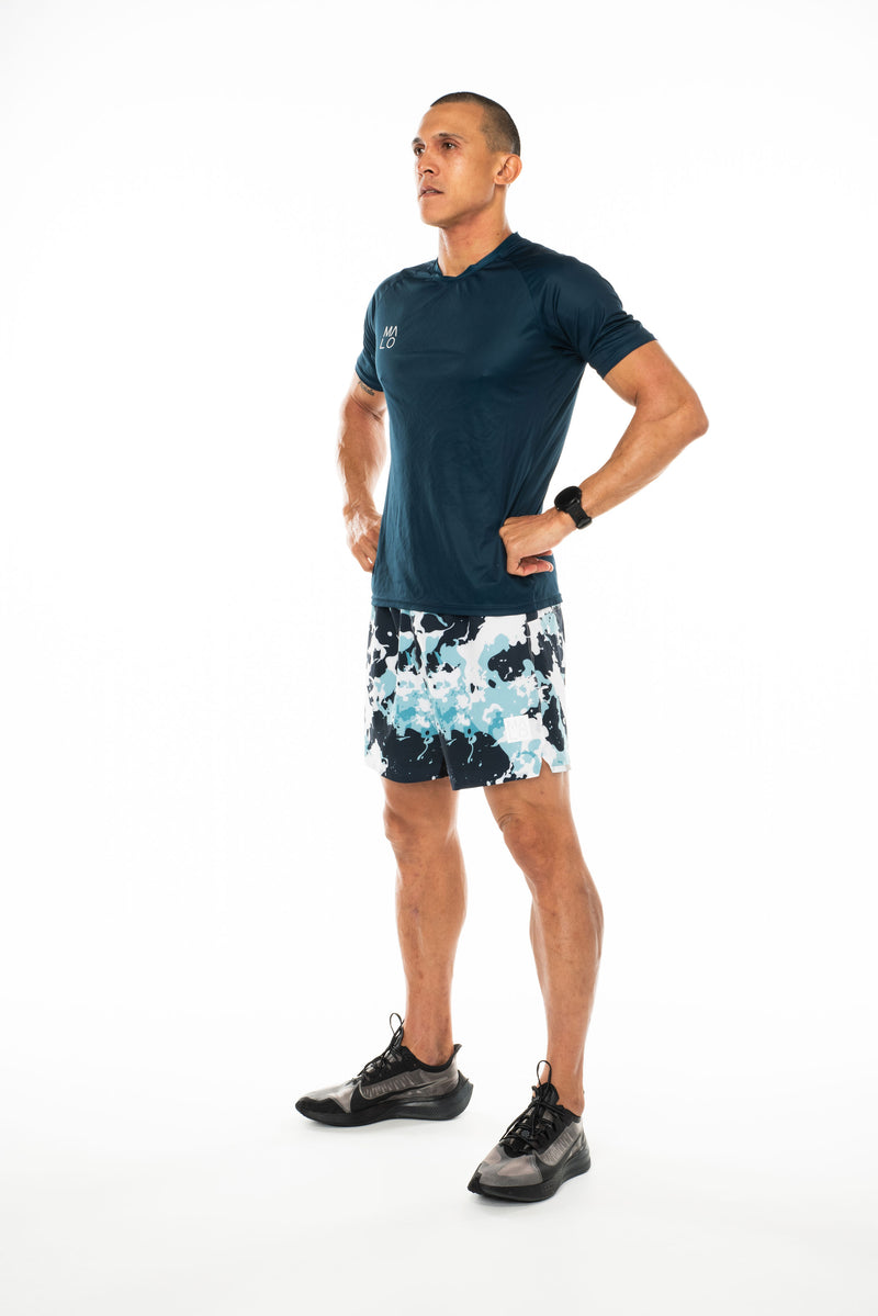 Left view men's blue performance tee. Lightweight and moisture-wicking running and workout t-shirt.