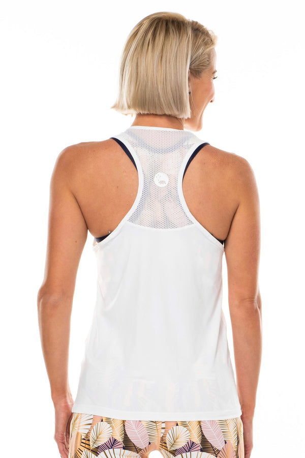 Back view Endure Tank. White sleeveless top with reflective logo. Women's tank top with mesh panel.