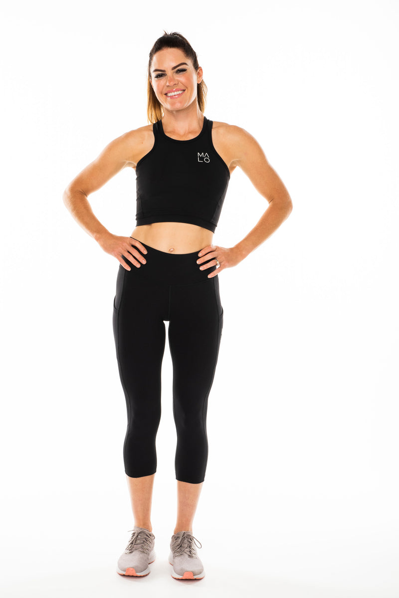 Women's Core Crop.  Black sleeveless technical top for workouts and athleisure.