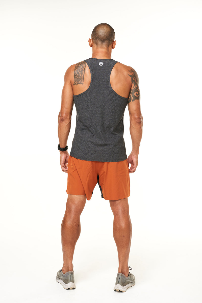 Back view of men's rust Rep Shorts. Gym shorts with a 7" inseam and liner.