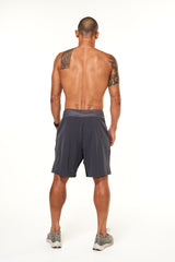 Back view of men's Arvo Shorts. Grey gym shorts with a 9.5" inseam and 4-way stretch waistband.