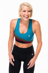 EcoActive Racergirl Bra - Pulse. Lightweight sports bra with quick-dry properties.