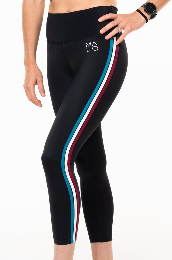 EcoActive 7/8 Leggings - Strata. Black quick-dry leggings with red, white, and blue stripes.
