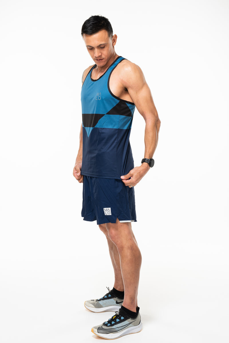 Left view men's cobalt/navy tank top. Lightweight performance singlet for running and working out.