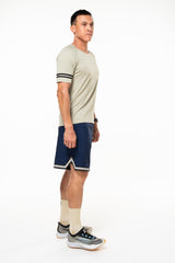 Right view of men's Spectrum Tee - Sand/Black. Breathable tan workout shirt. Sweat-wicking short sleeve shirt.