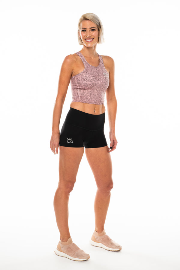 Women's Core Crop. Pink technical top for workouts and athleisure.