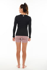 Back view Endure Long Sleeve. Women's black running shirt. Reflective logo for safety.