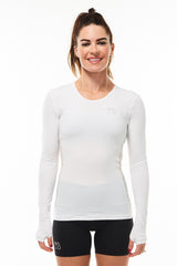 Women's Endure Long Sleeve Shirt. White performance tee. Running shirt with thumb holes.