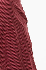 Close view of Nantucket Reflect Arvo Shorts fabric. Red diamond print design. Workout shorts.